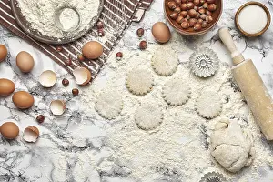 Kitchen Still Life Images Stampe: Top view of a kitchenware and baking ingredients on a marble table background