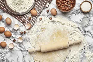 Marble Table Background Stampe: Top view of a kitchenware and baking ingredients on a marble table background