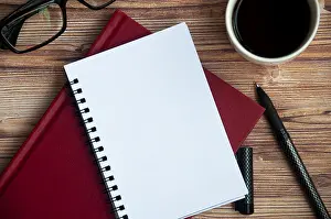 Business Attire Concept Stampe: Top view of notepad with customizable space for text or message