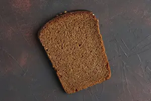 Breakfast Meal Idea Stampe: Top view of piece of broun bread