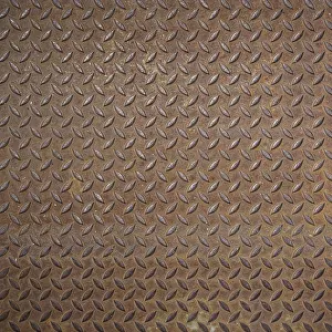Deserted Industrial Scene Stampe: Front view of a rusty panel with non-slip surface