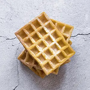 Belgian Waffles Stampe: Top view stack waffles concrete surface