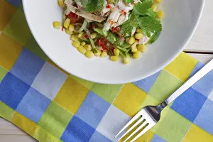 Colorful Salad Bowl Stampe: Top view of part of table with salad with corn