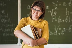 Office Work Station Setup Stampe: Front view teacher with stack books