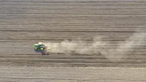 Field Work And Cultivation Stampe: Above view of tractor as pulling machine