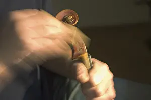 Handicraft Woodwork Stampe: Violin maker is working at the scroll of a violin
