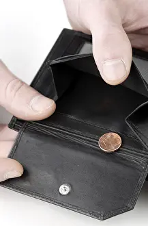 Foreign Currency Exchange Stampe: Wallet opened to show last cent