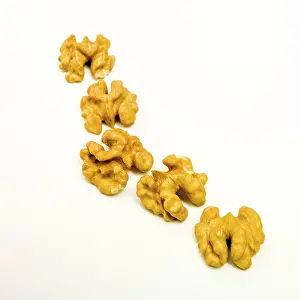 Deserted Walnut Scene Stampe: Walnuts on white background