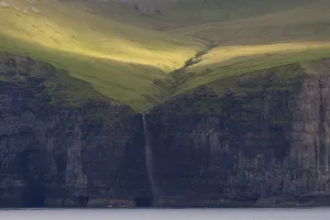 Northern Europe Waterfalls Stampe: Waterfall falling over steep cliffs