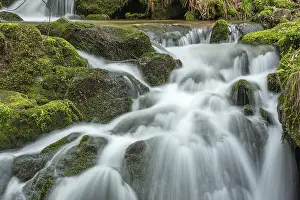 Uninhabited Mountain Torrent Stampe: Waterfall on a mountain stream in spring