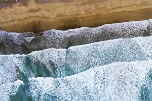 Canary Islands Coastal Area Stampe: Waves running out at sandy beach