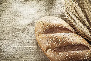 Wheat Bread Stampe: Wheat ears bread on burlap background