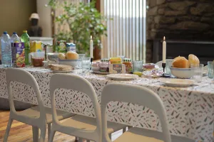 Wooden Floor Interior Stampe: White table setting, plastic tablecloth