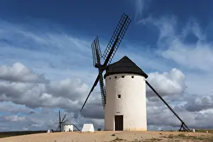 Campo De Criptana Landscape Stampe: White windmill under a dramatic sky with other mills in the background