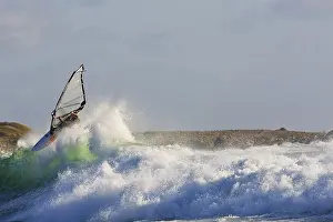 Water Sports Enthusiast Stampe: Windsurfer in action