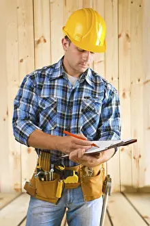 Construction Worker Stampe: Worker write on clipboard