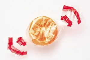 Sweet Treats Packaging Stampe: Wrapped fruit candy in the shape of an orange slice