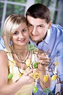 Easter Decoration Ideas Stampe: Young couple decorating for Easter