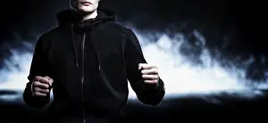 Martial Arts Concept Stampe: Young kickboxer posing in the studio