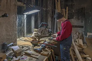 Northern German Youth Stampe: Young man at a Flex in his workshop