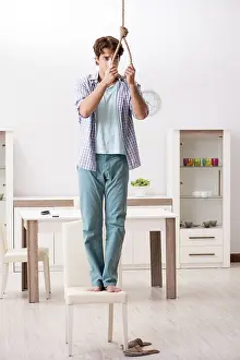 Young Adult Depression Stampe: Young man preparing to commit suicide by hanging