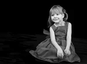 Studio Portrait Photography Stampe: Young model posing on black background