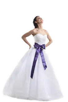 Wedding Celebration Stampe: Young smiling bride posing in studio